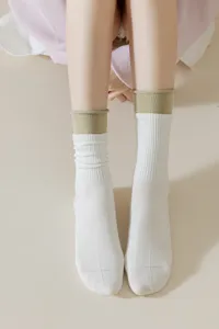 Women's mid-tube color-block double ribbed fake two-piece casual sports socks detailed view.