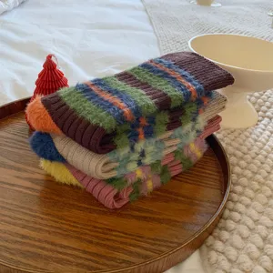 Cozy fuzzy striped mid-tube women socks, warm winter vintage color block knit socks.