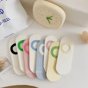 Detail shot of colorful women boat socks, thin summer low-cut cotton socks with contrast rings.