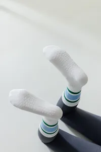 Non-slip yoga socks for women, breathable athletic crew socks with grip dots for Pilates fitness.