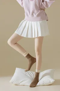 Detailed shot of women's mid-tube contrast color ribbed socks, stylish and comfortable daily wear.