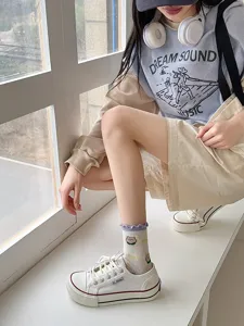 Cute breathable mesh mid-calf socks for women with cartoon bear and ruffle cuff design for summer.