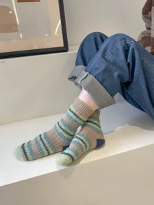 Cozy fuzzy striped mid-calf socks detail shot, retro color block warm winter women socks.