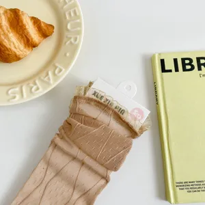 Chaussettes mi-mollet en dentelle transparente pour femmes, été fines et respirantes pour tenues.
