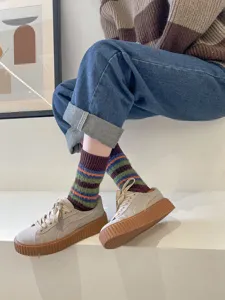 Cozy fuzzy striped mid-calf socks for women, retro colorblock winter warm knit hosiery.
