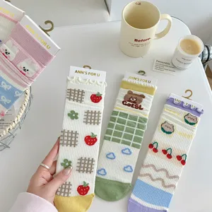 Cute cotton mesh mid-tube socks featuring adorable strawberry, bear, and grid patterns.