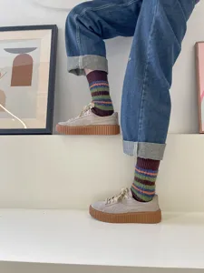 Fuzzy striped mid-calf socks for women, cozy winter warm retro style knit hosiery detail.