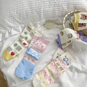Cute Korean style women mesh breathable cotton mid-tube socks with sweet cartoon patterns.
