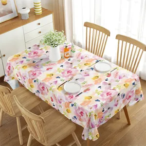 Mantel rectangular impermeable con estampado floral para decoracion de mesa de hogar.