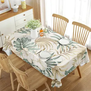 Waterproof tropical leaf tablecloth detail, perfect for dining room decor and summer holiday styling.