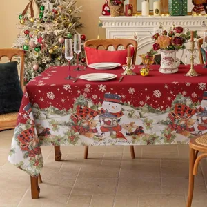 Mantel de mesa rectangular rojo impermeable navideño con lindo muñeco de nieve para decoración.