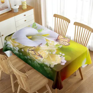 Detalle de mantel impermeable con estampado floral 3D de lirio de cala y mariposa.