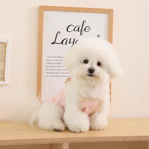 Cute pink lace pet vest for small dogs and cats, breathable summer puppy apparel detail view.