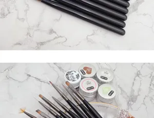 Nail art brush set detail showing fine liner and carving brushes with black handles.