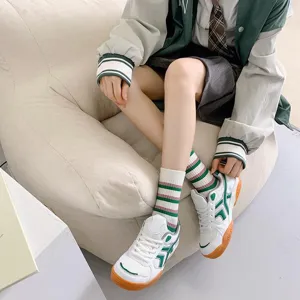 Green striped mid-tube socks for women, Japanese college style cute hosiery for autumn.