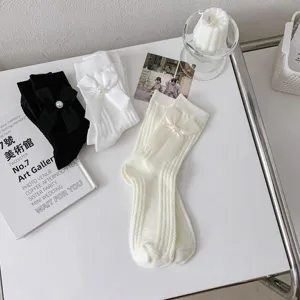 Chaussettes mi-hautes Lolita avec nœud pour femmes, chaussettes de princesse style JK japonais en détail.
