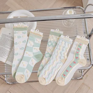 Detailed view of sheer summer women socks featuring cute heart and grid patterns, breathable mesh design.