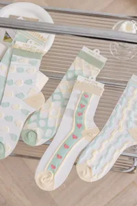 Cute Japanese style ultra-thin mesh socks featuring sweet heart and grid patterns.