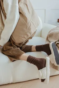 Cozy brown ribbed knit mid-tube wool socks for women, perfect for winter daily wear.