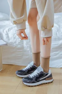 Chaussettes mi-mollet unies confortables à bord roulé pour femmes, style rétro mode printemps