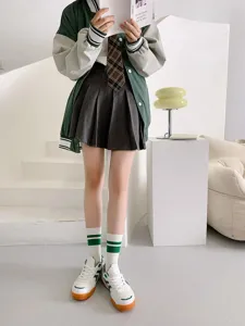 Green striped mid-tube socks for women, retro Japanese college style daily casual wear detail.
