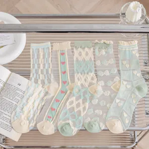Sheer mesh socks detail view, featuring cute heart and grid patterns for summer style.