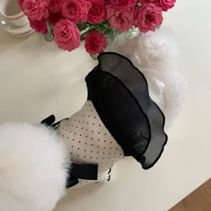 Cute polka dot pet dress with black ruffles and bow for small dogs and cats spring detail.