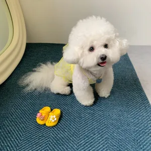 Details of the spring summer breathable mesh dog dress for small pets cute yellow outfit.