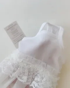 White lace pet dress detail view, summer thin strap pet clothes for small dogs and cats.