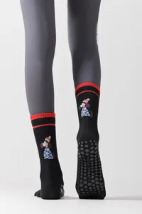 Black five-toe yoga socks with cute dog pattern and anti-slip silicone grip soles.