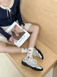 Cute Japanese style mid-tube women socks with sweet heart patterns, perfect for daily wear.