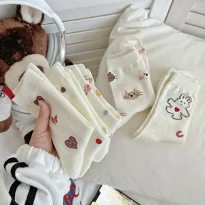 Cute women mid-tube socks with sweet heart cat and bear cartoon prints, Japanese preppy style.