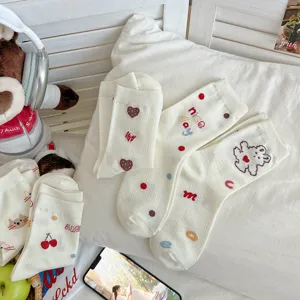 Cute cotton mid-tube socks for women, featuring sweet bear and heart embroidery details.