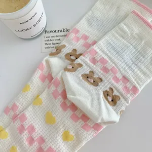 Cute pink checkerboard mesh mid-tube cotton socks with sweet bear and heart patterns for women.