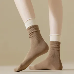 Contrast color mid-tube socks for women, faux two-piece design, stylish casual daily wear.