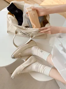 Sweet bow embroidered mid-tube socks, breathable mesh thin design for spring and summer daily wear.
