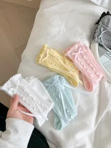 Sweet ruffled bow mid-calf socks detail, cute Korean style design for daily wear.