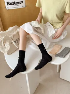 Sweet ballet style bow embroidered mesh socks, breathable thin mid-tube slouch socks for women.