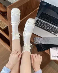 Sweet cute lace bow mid-calf socks for women, fashionable JK style hosiery for autumn.