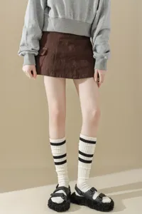 Striped knee-high socks detail view, cozy knit slouch socks for daily wear or school style.