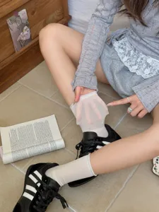 Women's summer thin sheer mid-calf socks solid color casual socks for sneakers footwear.