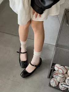 Women sheer ice silk white socks detail shot, breathable summer stacking hosiery style.