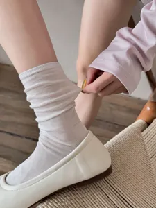 Comfortable women's sheer mid-tube socks in solid white, stylish daily wear great detail.