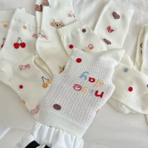 Cute Japanese style women's mid-tube socks featuring sweet cat and cherry prints.
