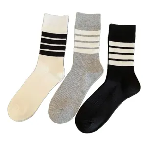 Classic four-bar striped mid-calf socks for women, Japanese JK style breathable casual hosiery.