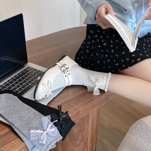 Korean sweet cute lace bow ruffle mid-tube socks, autumn and winter versatile JK slouch socks.