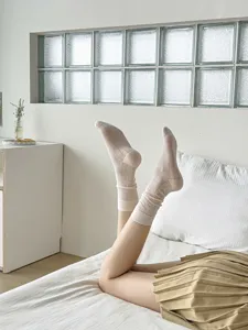 Detailed view of sweet women's mesh breathable mid-tube slouch socks for spring and summer.