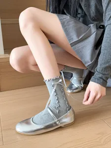 Grey ruffle mid tube socks featuring sweet bow streamers for cute JK lolita daily wear.
