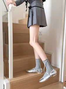 Sweet Japanese style women mid-tube socks with cute ruffle edge and bow ribbon detail.