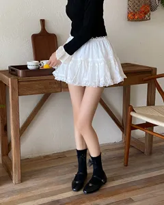Detailed shot of cute black bow lace mid-tube socks, perfect for sweet daily styling.